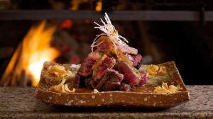 rib eye steak with wafu sauce and garlic crisps   rib eye no tamanegi ponzu fuumi